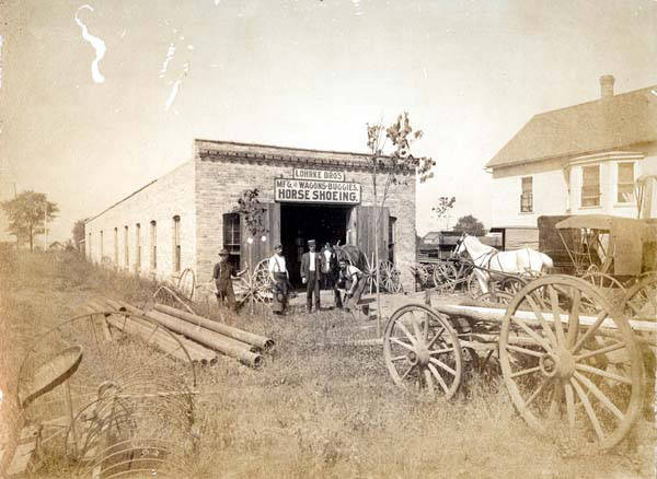 The Lohrke Bros. blacksmith shop on Niles Center Road just north of St. Peter's Catholic Church about 1902