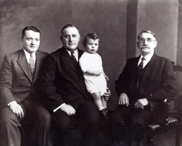 Four generations of the Busscher family, which was instrumental in the development of business in Niles Centre:  left to right:  George, III; George, Jr.; George D; George, Sr